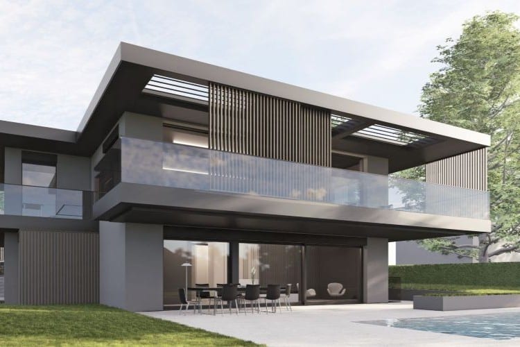 Vue en contre-plongée d'une villa d'exception moderne depuis le jardin