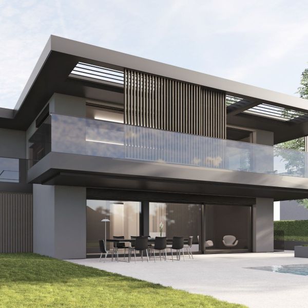 Vue en contre-plongée d'une villa d'exception moderne depuis le jardin